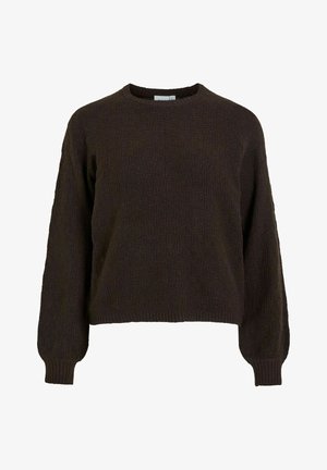 Ruda megzta džemperis su tekstūru, apvali iškirptė ir ilgomis rankovėmis. Guminiai rankogaliai ir apatinė dalis užbaigia dizainą.