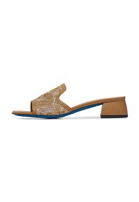 Tan slide sandal featuring an embroidered upper with intricate gold thread detailing, an open toe, and a short, block heel in blue and black.