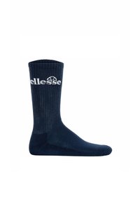 Calza a coste blu navy con un motivo testurizzato, caratterizzata da un logo bianco. Il materiale sembra morbido ed elastico, progettato per garantire comfort e vestibilità.