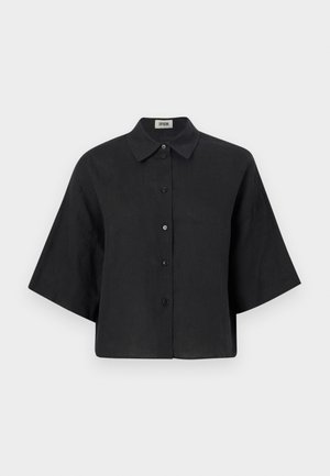 Black linen cropped shirt with a pointed collar, short sleeves, and front button closure. Features a relaxed fit and smooth texture.