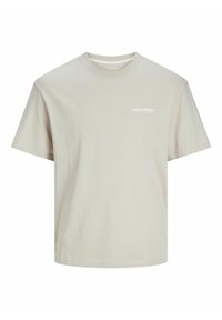 Lys beige bomulds T-shirt, rund hals, korte ærmer, med et lille hvidt logo på venstre brystområde. Glat tekstur, enkelt design.