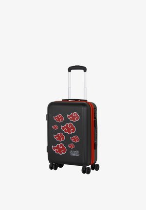 Valise rigide noire avec des accents rouges et des motifs de nuages. Elle possède une poignée rétractable et quatre roulettes pour une mobilité optimale.