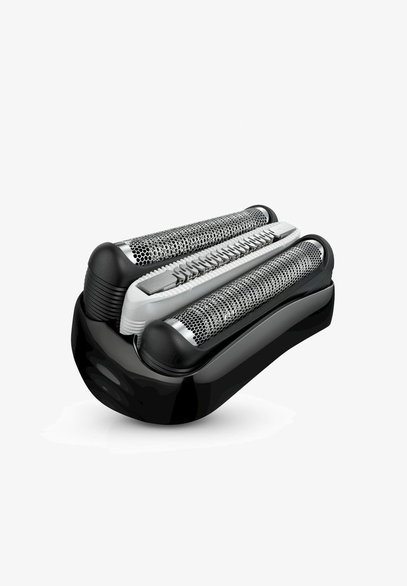 Electric razor replacement head with two metal foil cutters and a central trimmer on a black and white plastic base.