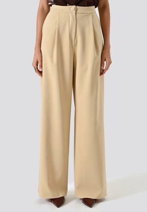 PALAZZO CON PINCES IN TECNICO - Pantaloni - beige