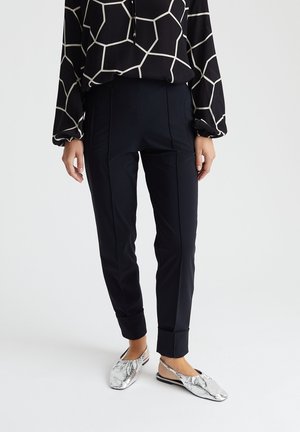 LEAH - Trousers - black