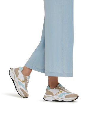 White and beige sporty sneakers with aqua accents; features a thick sole, suede and mesh materials, and gold detailing on the sides.