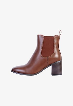 Brown leather ankle boot with a rounded toe, elastic side panels, and a textured block heel. Features a pull tab for easy wear.