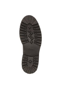 Semelle de chaussure en caoutchouc noir avec surface texturée. Présente de profondes rainures et un motif en croix pour l'adh érence. Nom de la marque "Lowa" en relief.