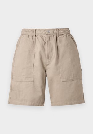 Beige cargo shorts med elastisk midjebånd, to frontlommer og strukturert stoff. Har vertikal ribbing for ekstra tekstur.