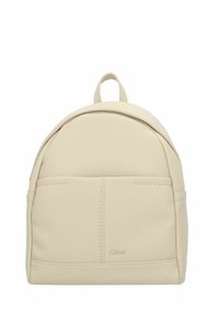 Zaino in pelle beige con design arrotondato, tasca frontale e dettagli di cucitura sottili. Presenta una maniglia superiore per una maggiore comodità nel trasporto.