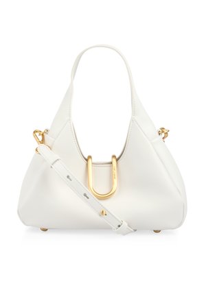 White leather handbag with a top handle, detachable shoulder strap, and a central gold U-shaped metal accent.