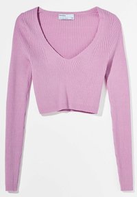 Pink ribbed long-sleeve crop top with a deep V-neckline, featuring textured fabric and fitted design that emphasizes a contoured shape.