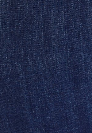 Donkerblauw denimstof met een gladde textuur, met subtiele variaties en een lichte glans. Geen zichtbare patronen of accenten.