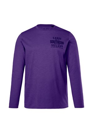 Fioletowa koszulka z długim rękawem, wykonana z miękkiej bawełny. Na lewej piersi znajduje się czarny napis "Canoe Southern Ireland".