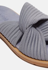 Gray fabric slide sandal featuring a pleated design with a knotted upper, soft interior lining, and a lightweight rubber sole.