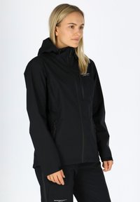 Black waterproof jacket with a hood, front zip, and two side pockets. Designed for outdoor use, featuring a sleek, functional silhouette.