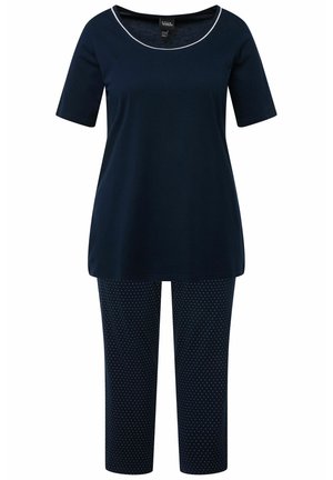 Set di pigiama blu navy composto da una maglietta a maniche corte con scollatura rotonda e piping bianco, abbinata a pantaloni capri a pois.