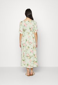 Pieces Maternity PMNYA MIDI DRESS - Vestido de malha - light green