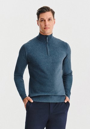 - Sweter