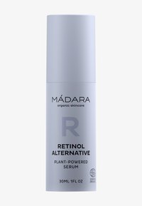 Ljuslila cylindrisk flaska med Retinol-alternativ serum. Har svart text och EcoCert-logotyp. Volym: 30 ml (1 fl oz).