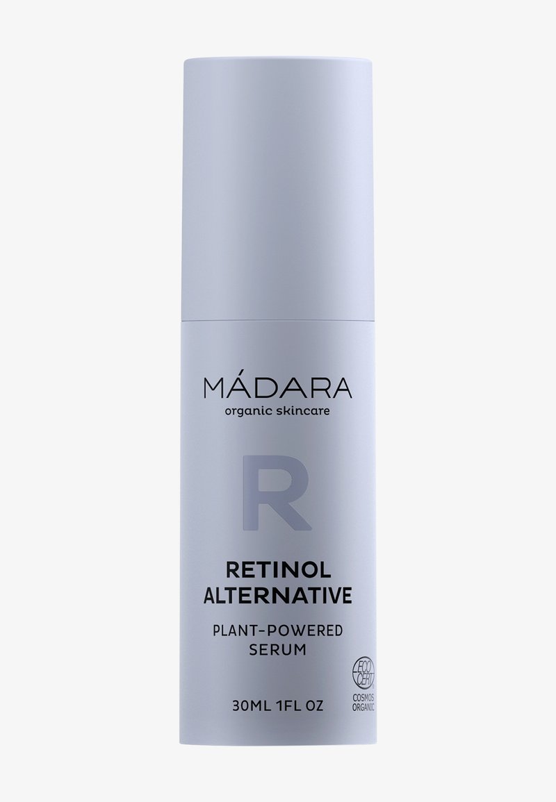 Ljuslila cylindrisk flaska med Retinol-alternativ serum. Har svart text och EcoCert-logotyp. Volym: 30 ml (1 fl oz).