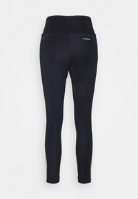 Svarta sportleggings med hög midja, med en mjuk yta och en vit logotyp på baksidan, designade för prestanda och komfort.