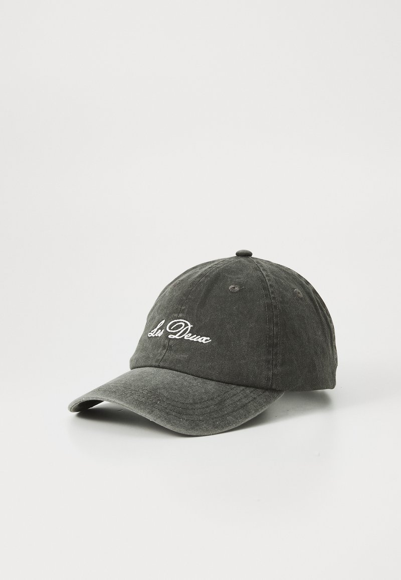 Dark gray baseball cap made of cotton, featuring an embroidered logo on the front, curved brim, and adjustable strap at the back.