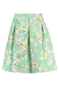 Jupe à imprimé floral vert pastel, avec des plis, une taille cintrée et un tissu léger illustré de diverses fleurs.