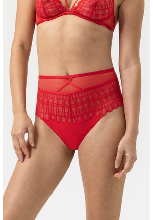 Red high-waisted brief with sheer mesh panel and intricate lace detailing. Features scalloped edges and crosshatch accents at the waistband.