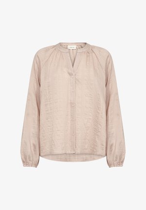 Heled roosa pluus, mis on valmistatud tekstuurist kangast, millel on kaeluseta kaelus, eest nupu sulgemine ja pikad, kogutud varrukad.