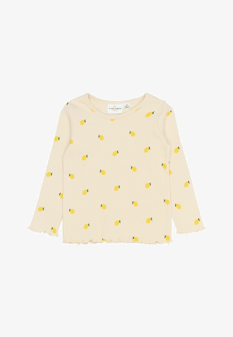 Gai dzeltenas garām piedurknēm krekls ar ribota tekstūra, kuram ir mazu citronu apdruka un viļņota apakšmala un piedurkņu maliņas.