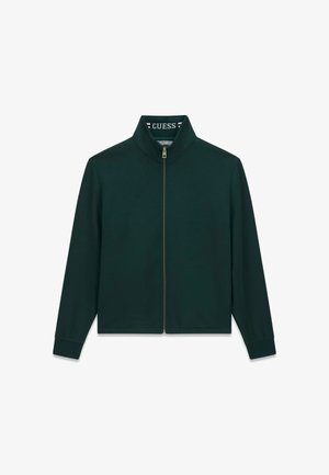 Veste zippée vert foncé à manches longues et col montant avec le nom de la marque Guess à l'intérieur du col.