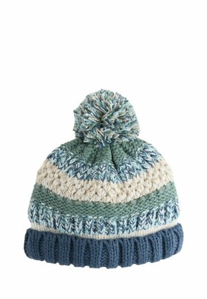 Caciula tricotată în nuanțe de teal, crem și navy, cu un model texturat. Are un pompon mare în vârf și o bandă de jos ribbată în navy.