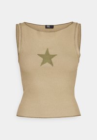Beige ribbad linne med figurnära passform, med en olivgrön stjärna broderad på framsidan och rund halsringning.