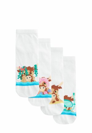 Four pairs of white socks featuring colorful cartoon animals in water, adorned with marine accessories and playful designs.