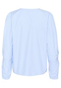 Blusa azzurro chiaro con forma quadrata, lunghe maniche a sbuffo e sottili righe verticali. Tessuto morbido con polsini delle maniche arricciati.