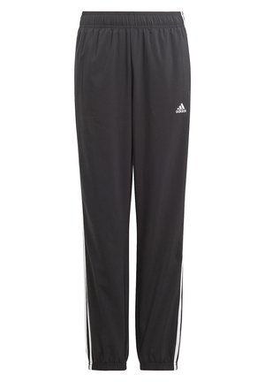 Pantalons de sport noirs avec une taille élastique, des bandes latérales blanches et un logo Adidas sur la cuisse gauche, fabriqués en matériau lisse et léger.
