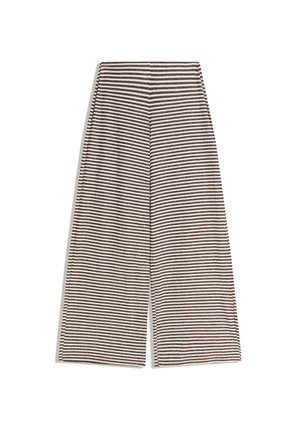 Pantalons larges à rayures noires et blanches avec une taille haute, présentant une texture lisse et une coupe décontractée, parfaits pour une tenue décontractée.