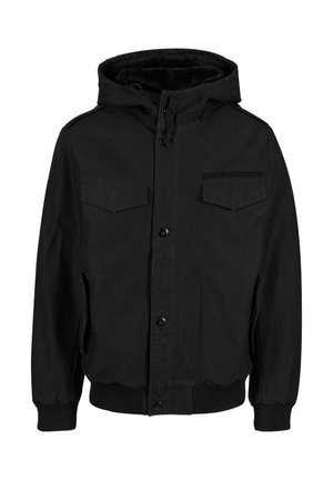 Veste extérieure noire avec une fermeture éclair à l'avant, deux poches poitrine, une capuche, des poignets et un ourlet côtelés, et une texture de tissu lisse et durable.