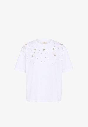 Balta medvilnės marškinėliai trumpomis rankovėmis, dekoruoti sidabriškai blizgiais apvaliais priklijuotais akmenimis, išdėstytais netvarkingai priekyje.