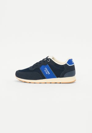 Navy blue athletic shoes with mesh and textile upper, white accents, and beige rubber sole. Features blue side panel with logo detail.