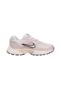 White and light pink athletic sneaker with mesh panels, cushioned sole, black Nike swoosh, and white laces, viewed from the side.
