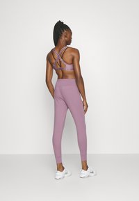 Under Armour MOTION JOGGER - Treningo apatinė dalis - misty purple/fresh orchid