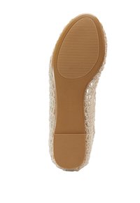 Suela de zapato de tela tejida en un tono beige claro con fondo de goma texturizada. Presenta una forma plana y redondeada, con bordes flexibles para mayor comodidad. Talla 37.
