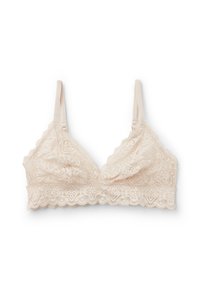 Lace bralette in een lichte beige kleur. Kenmerkt zich door een V-halsvorm, golvende randen en verstelbare bandjes met bloemmotieven.