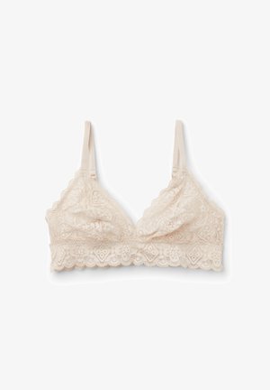 Bralette en dentelle de couleur beige clair. Présente une forme en V, des bords ondulés et des bretelles réglables ornées de motifs floraux.