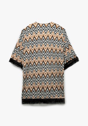 Franje kimono i mønsteret vævet stof med zigzag design i sort, hvid og rust-orange. Korte ærmer og åben front.