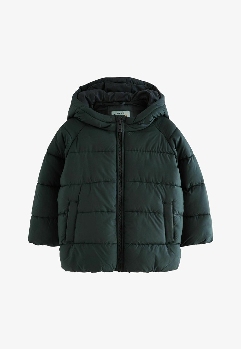 Tumši zaļš pūkains mētelis ar priekšējo rāvējslēdzēju, kapuci un sānu kabatām. Iespējas ar pārliku rakstu un elastīgām aprocēm siltumam un komfortam.