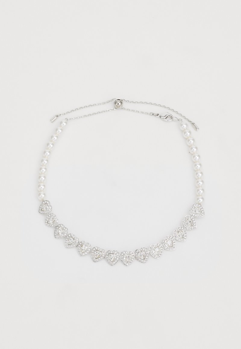 Silver necklace featuring pearl beads and heart-shaped pendants adorned with clear rhinestones in a graduated design. Adjustable chain clasp.