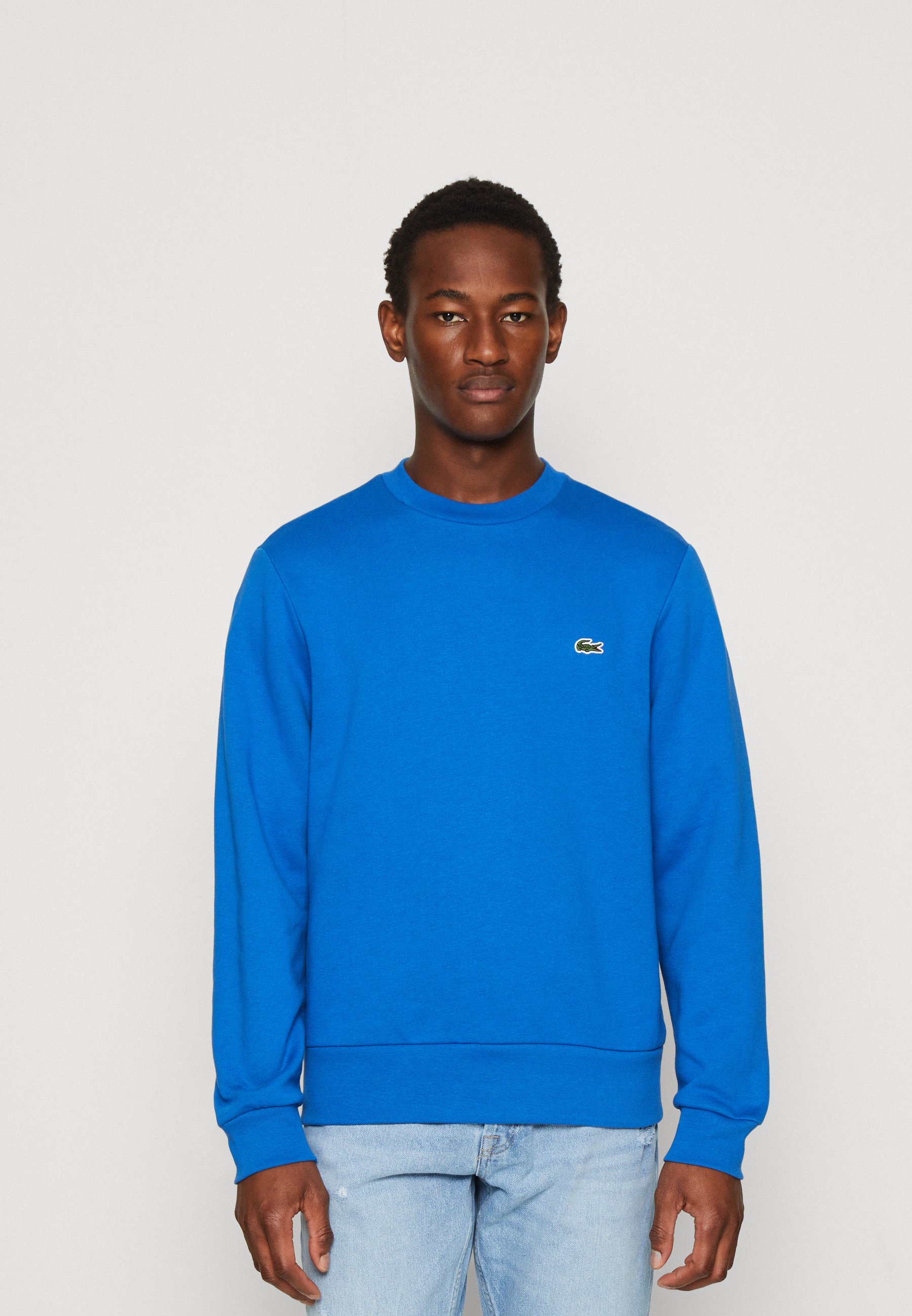 blue lacoste sweatshirt